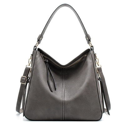 LIVIA'S POISE™ | crossbody van vegan leer