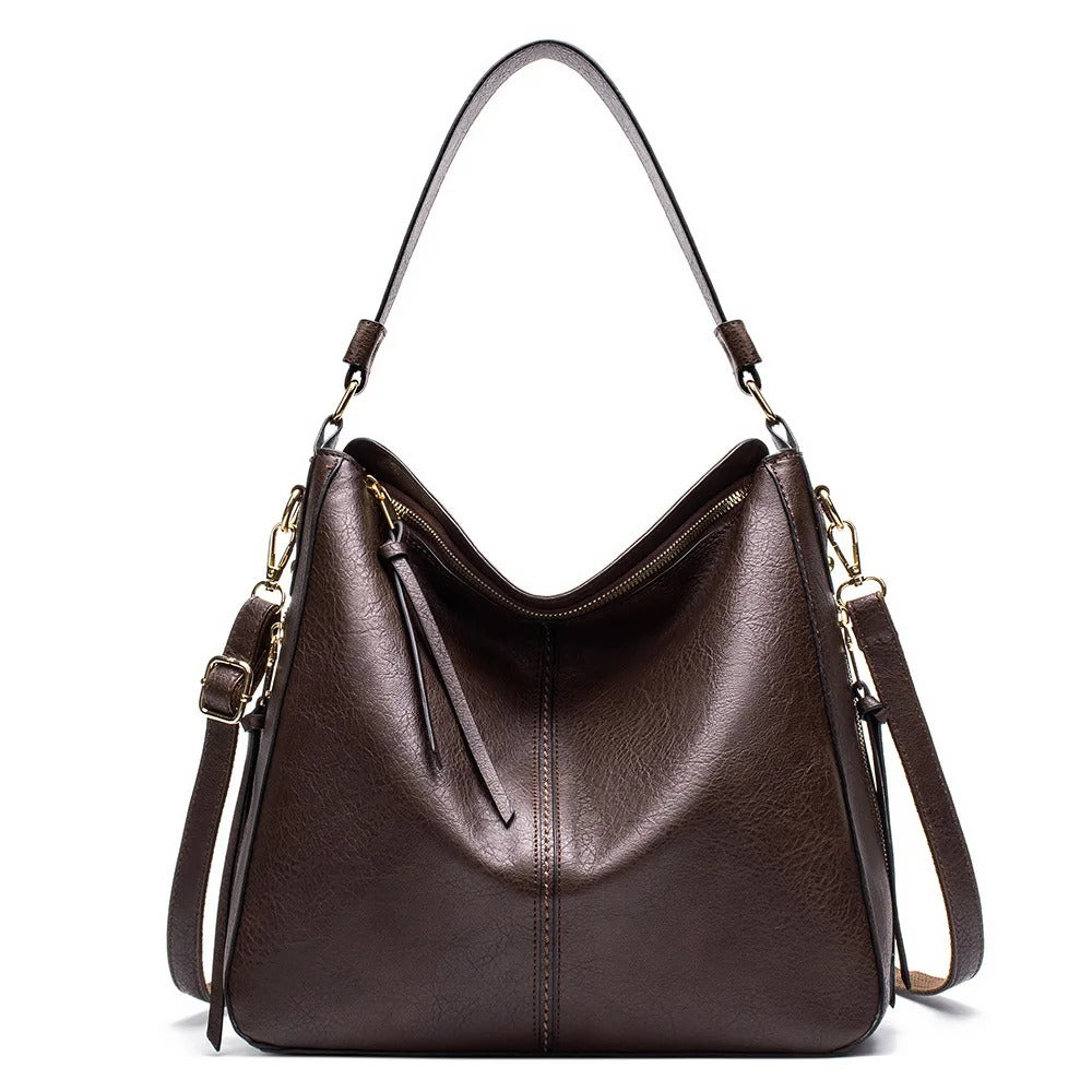 LIVIA'S POISE™ | crossbody van vegan leer